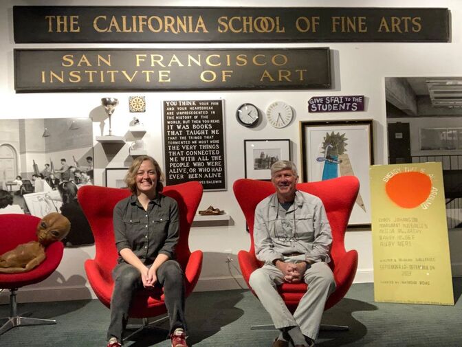 Becky Alexander and Jeff Gunderson seated in the Anne Bremer Memorial Library, SFAI